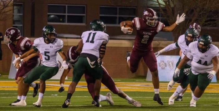 Picayune running back Dante Dowdell (2) leaps through West Point defenders during the fourth quarter of the Mississippi Class 5A football championships